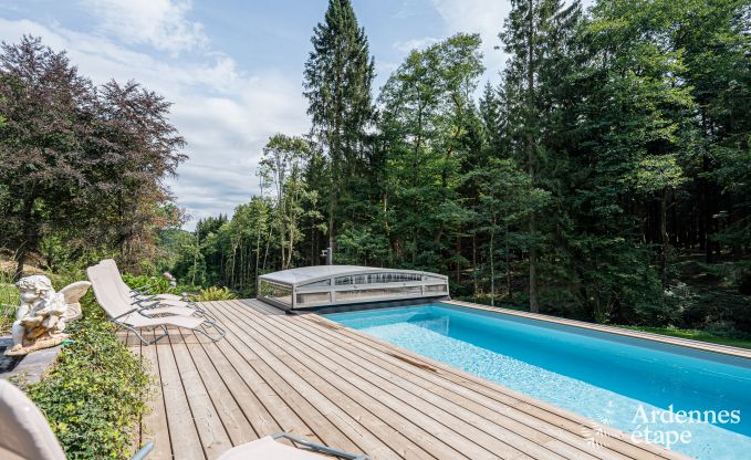 Charmant vakantiehuis in Manhay voor 8 personen, met verwarmd buitenzwembad, priv�vijver en fietsgarage aan de rand van het bos