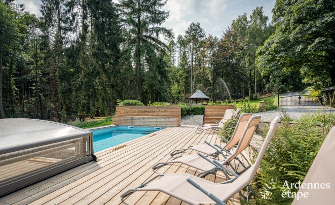 Charmant vakantiehuis in Manhay voor 8 personen, met verwarmd buitenzwembad, priv�vijver en fietsgarage aan de rand van het bos