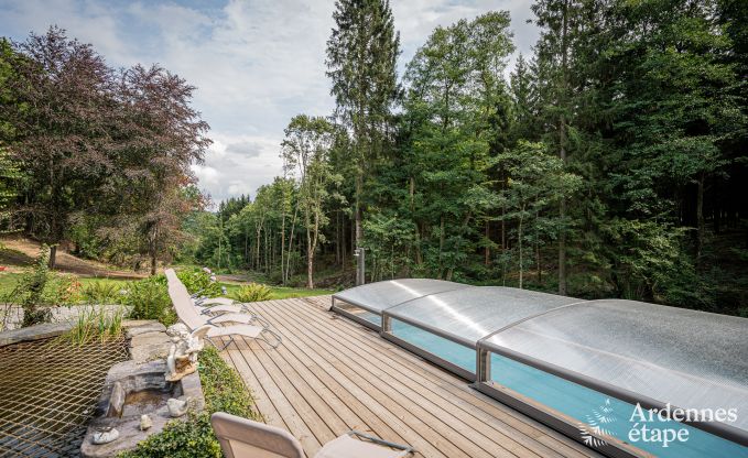 Charmant vakantiehuis in Manhay voor 8 personen, met verwarmd buitenzwembad, priv�vijver en fietsgarage aan de rand van het bos