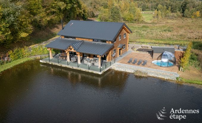 Ruime chalet voor 8 personen in Trois-Ponts met binnen-buitenzwembad, sauna en priv�terras aan het water