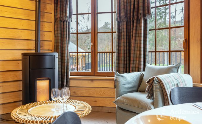 Charmante houten paalwoning boven een vijver in Vencimont, voor 4 personen